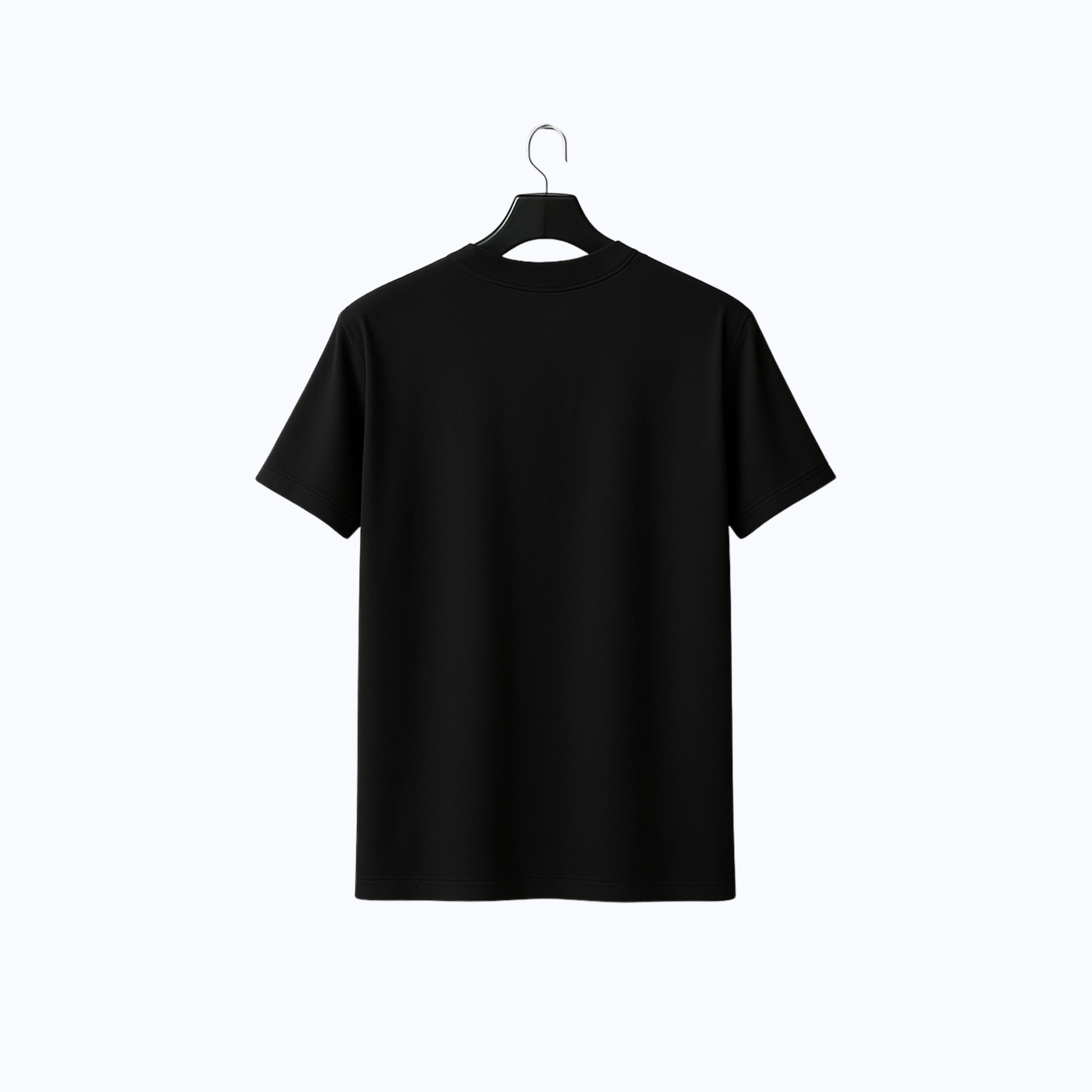 Black t-shirt on a hanger against a white background