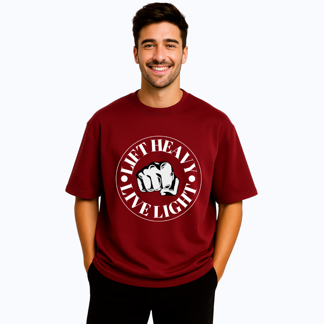 Man wearing a red t-shirt with 'Lift Heavy, Live Light' text and graphic on a white background