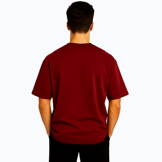 Person wearing a red t-shirt on a white background
